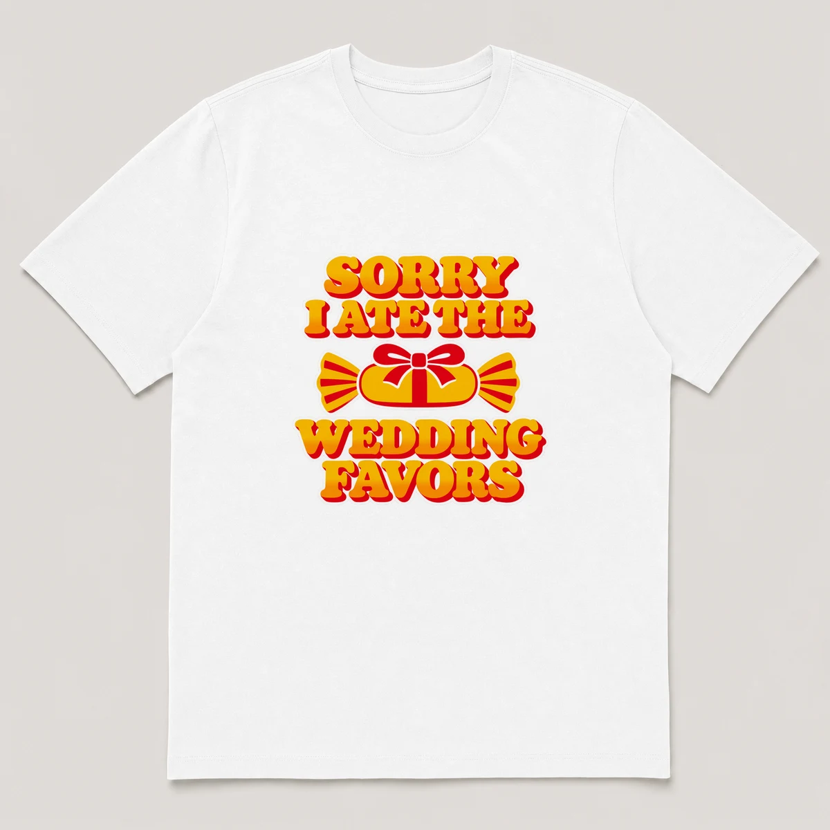 flat lay mockup of a heavyweight tee in black and white, front view, with the printed line SORRY I ATE THE / WEDDING FAVORS across the chest, White front view