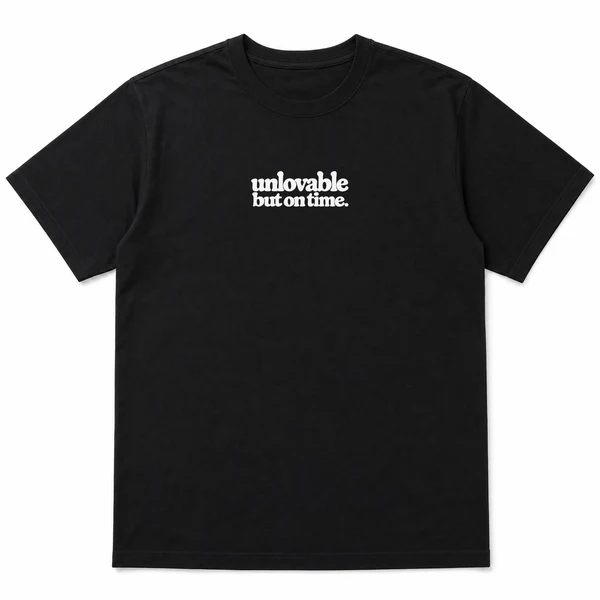flat lay mockup of a heavyweight tee in black and white, front view, with the printed line unlovable but on time across the chest