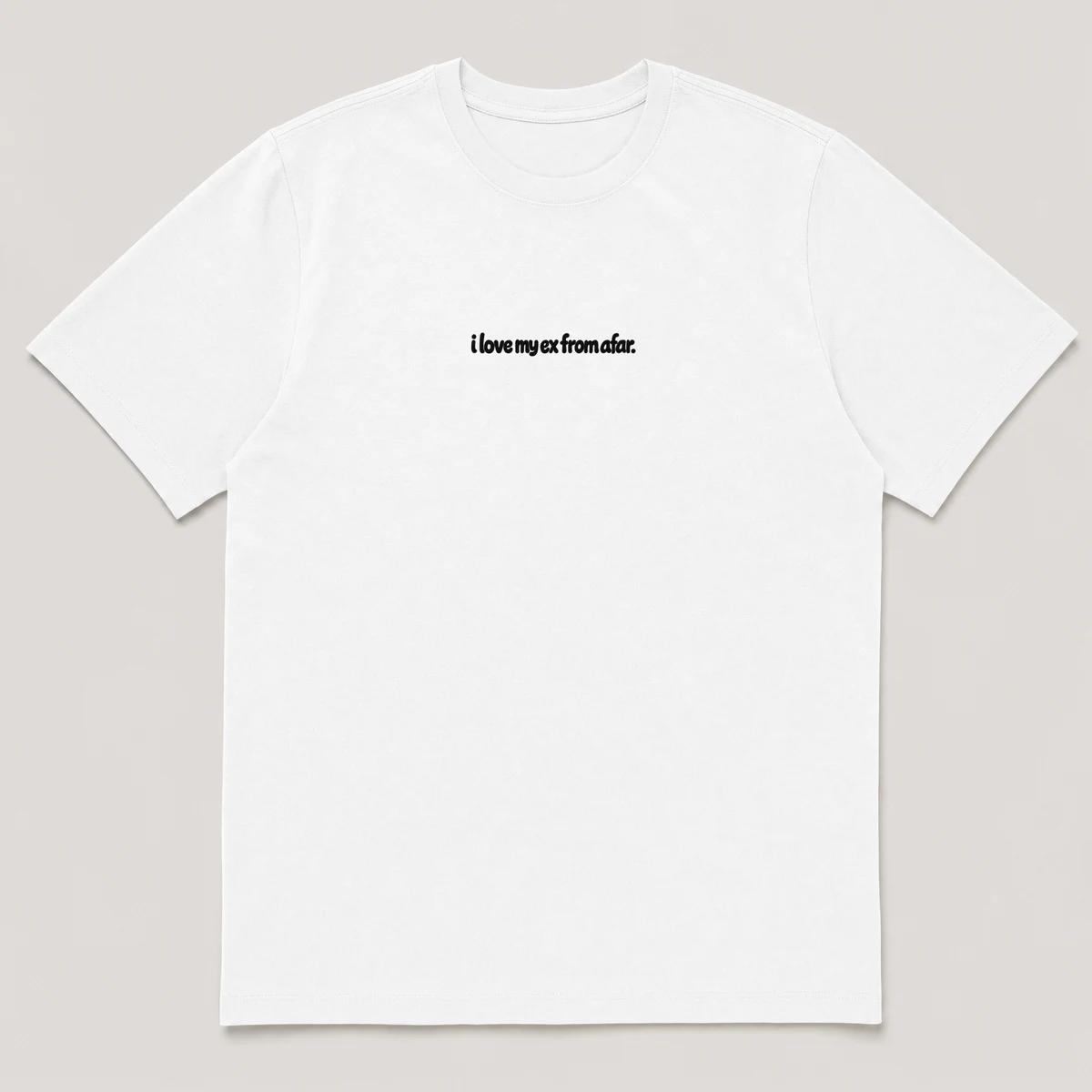flat lay mockup of a heavyweight tee in black and white, front view, with the printed line i love my ex from afar across the chest, White front view