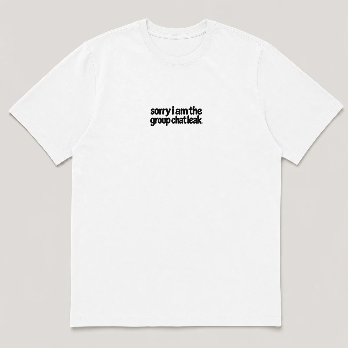 flat lay mockup of a heavyweight tee in black and white, front view, with the printed line sorry i am the group chat leak across the chest, White front view
